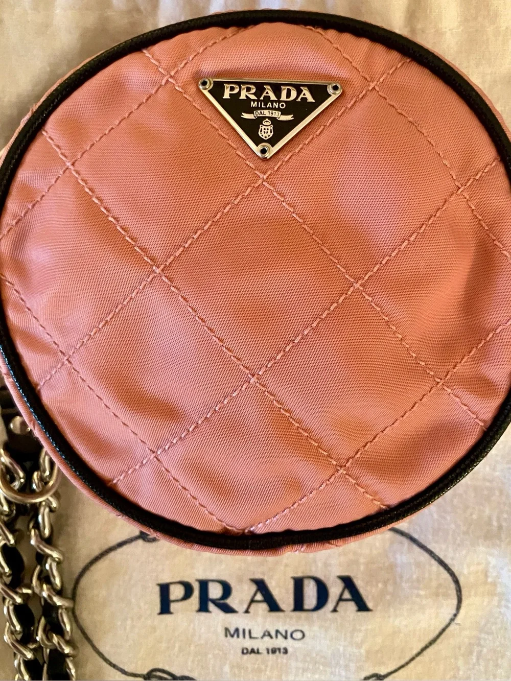 PRADA MINI CIRCLE QUILTED BAG/WRISTLET